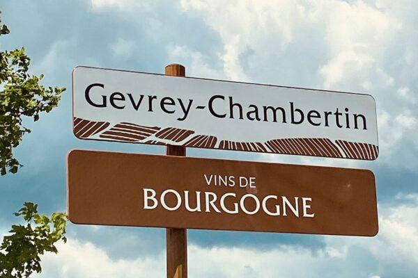 A photo of a sign saying Gevrey Chambertin and Vins de Bourgogne.