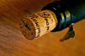 A picture of a broken wine cork, open old wine with fragile cork.