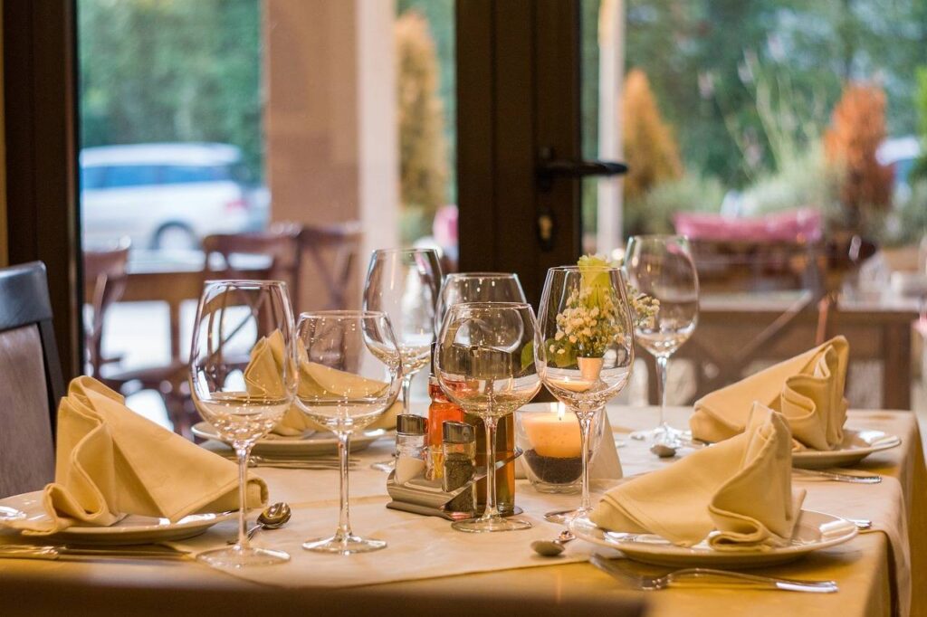 A photo of wine glasses on a restaurant table.